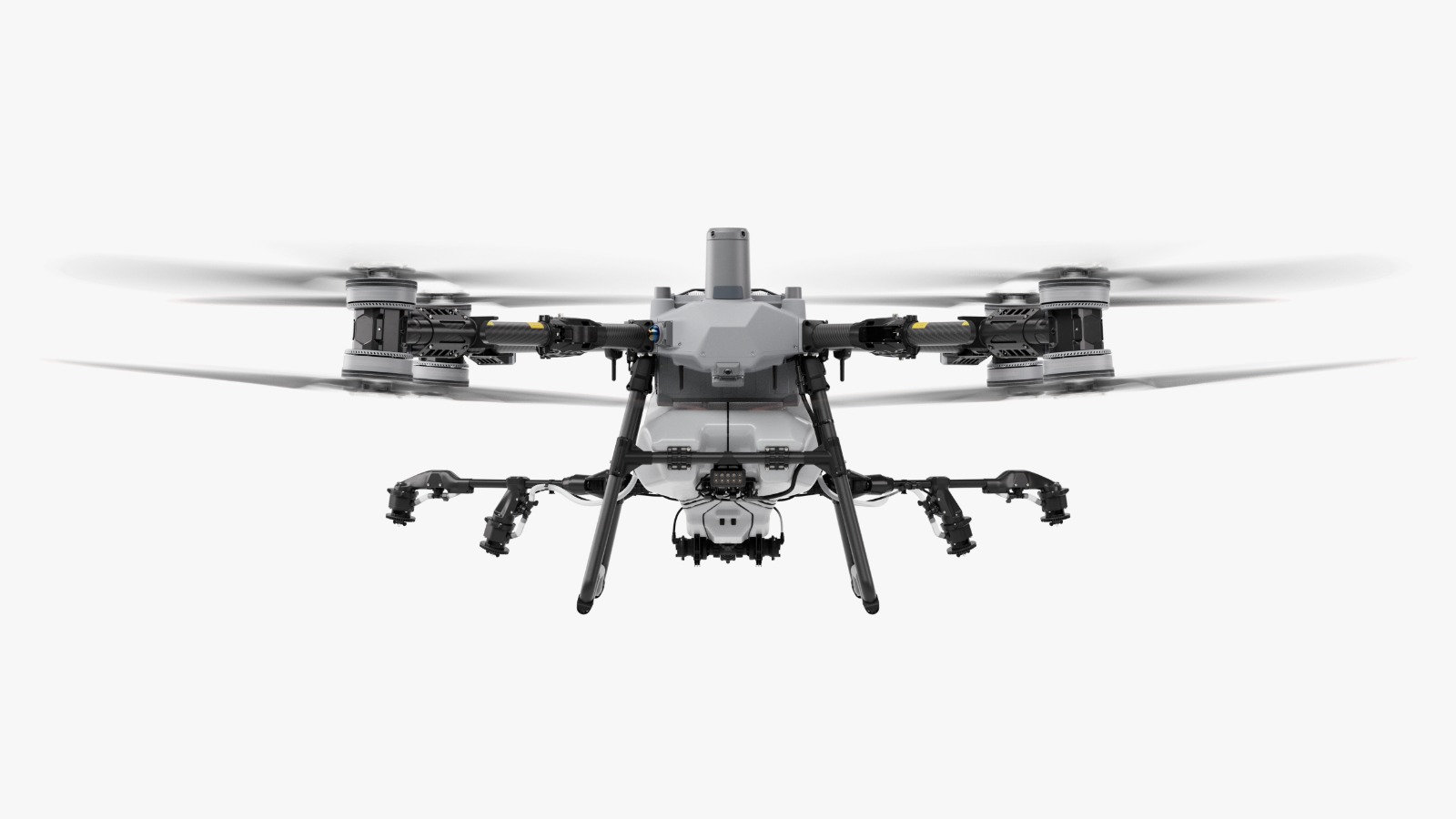 DJI Agras T100 — vista frontal em voo